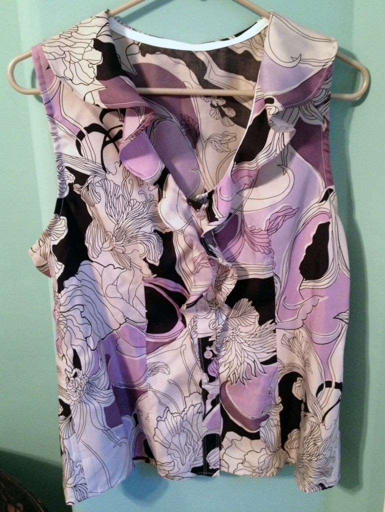 Altered blouse on hanger